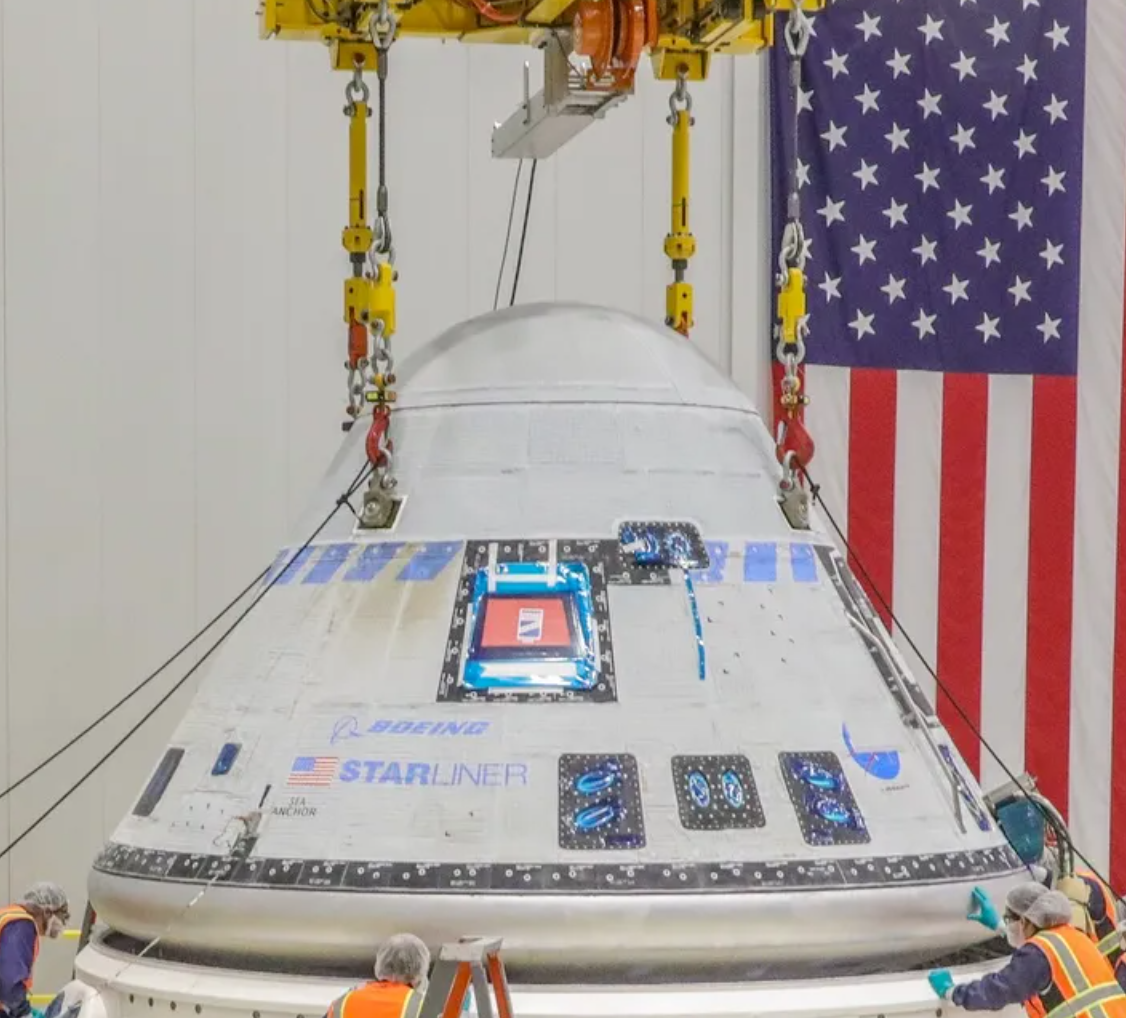 Four Ron Crane Scales weighing the Boeing Starliner spacecraft.